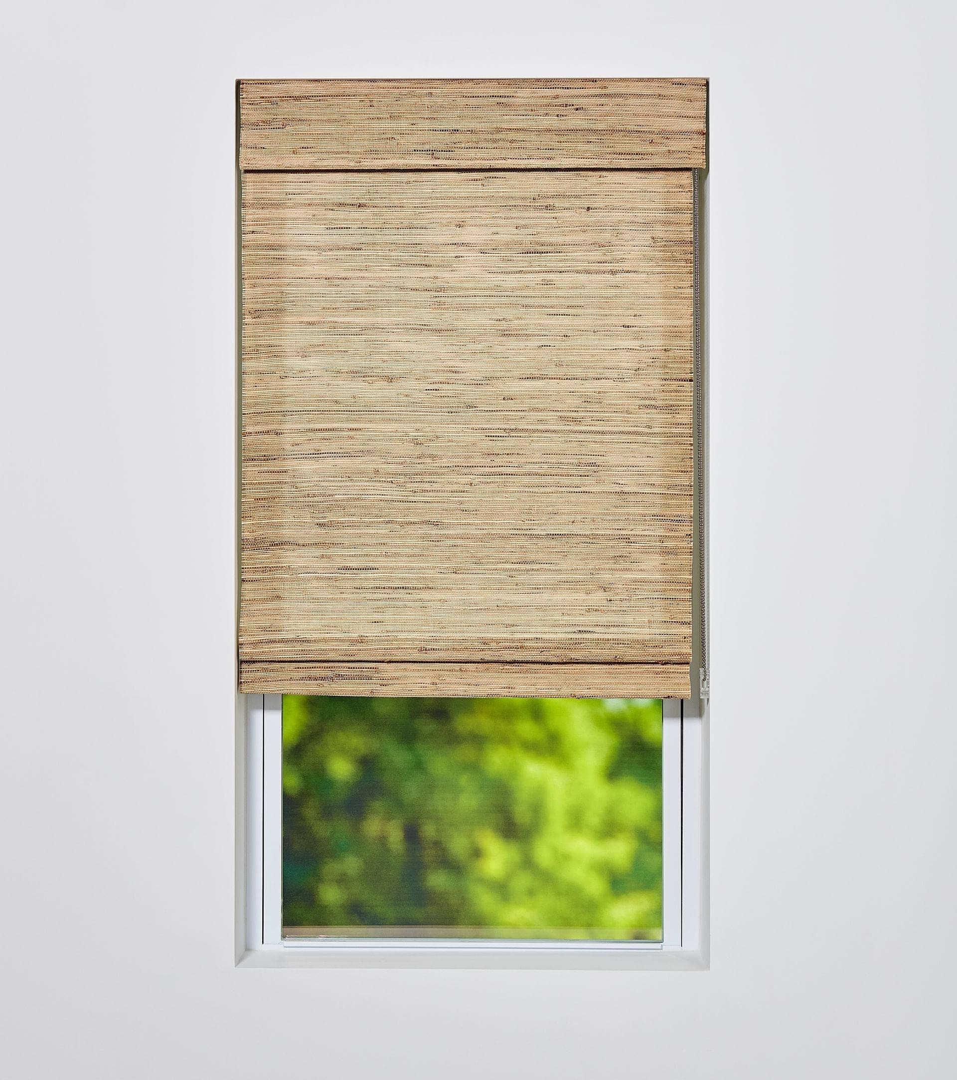 Clutch lift on a woven wood shade