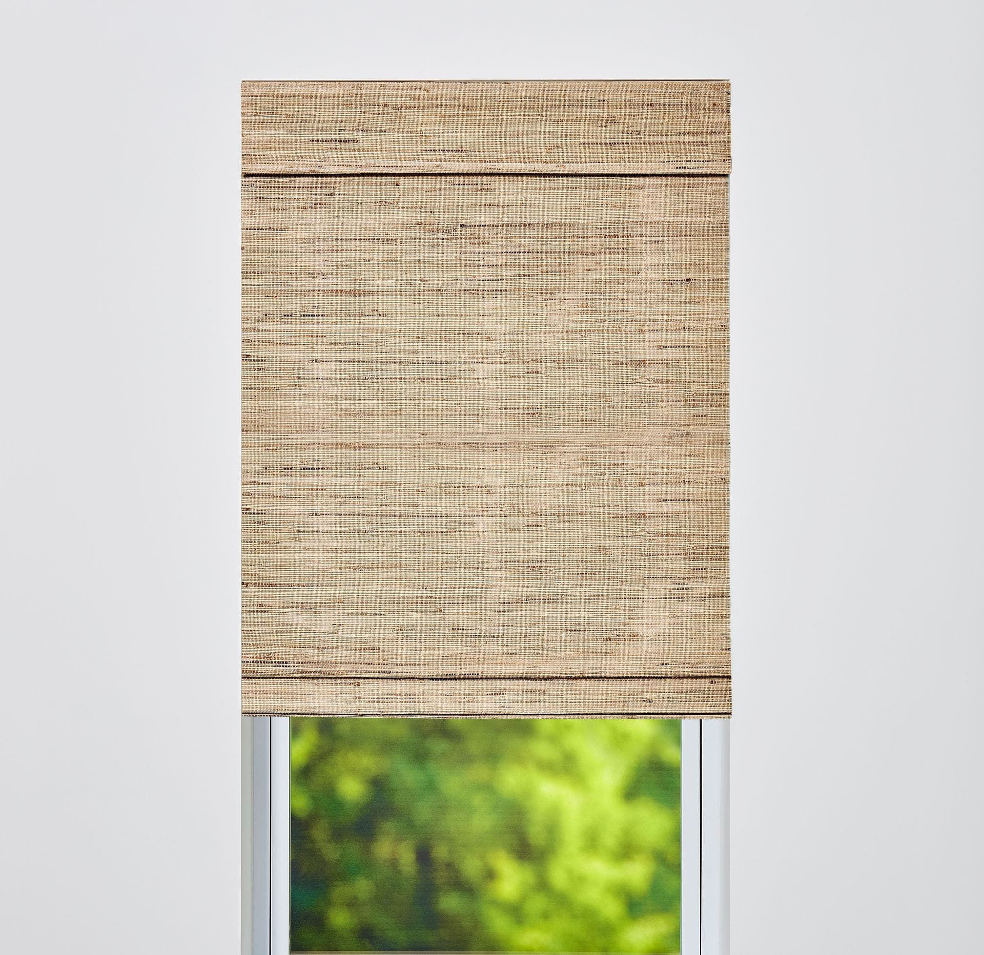 Woven wood shade with a room darkening liner