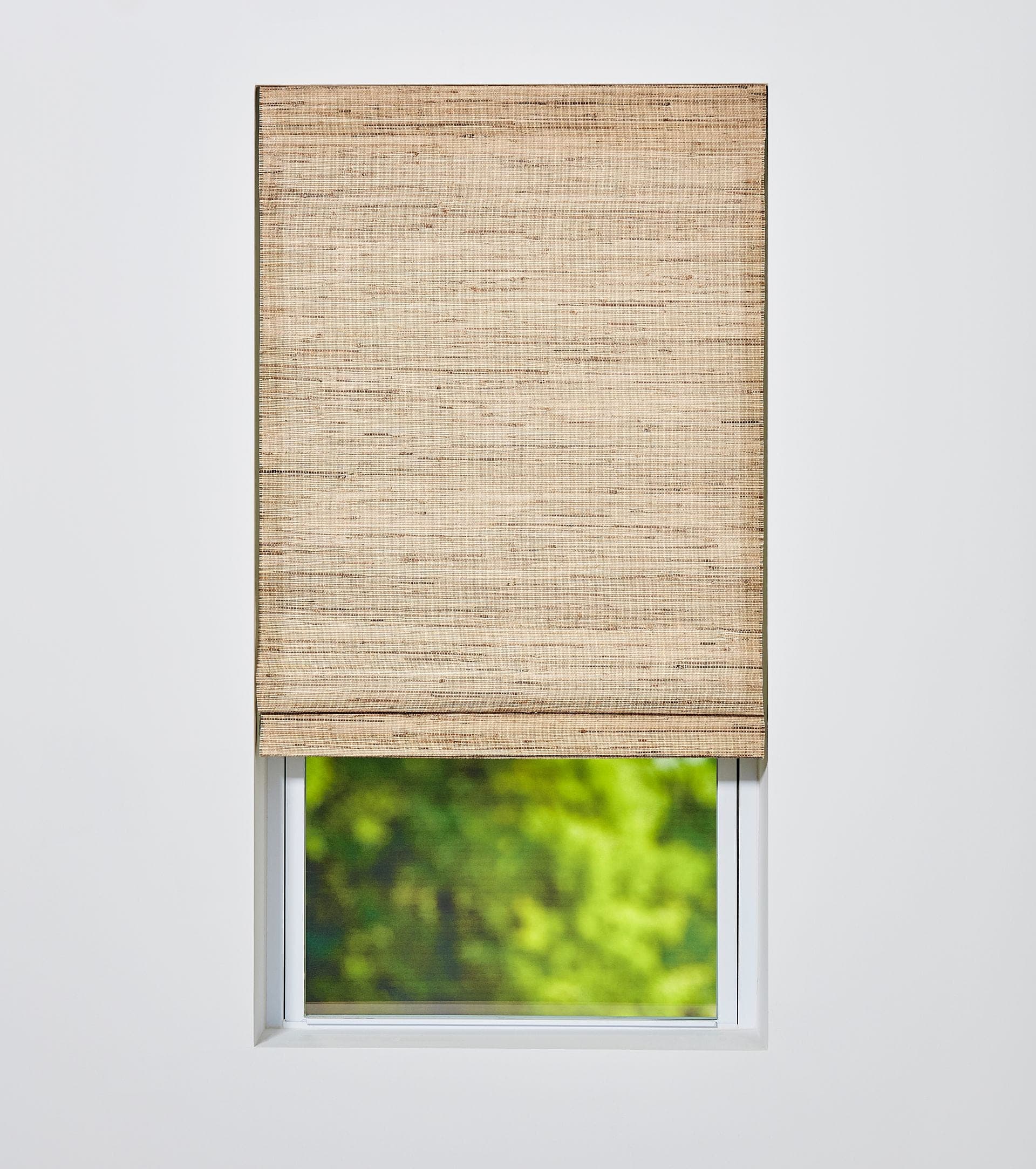 Waterfall style woven wood shade