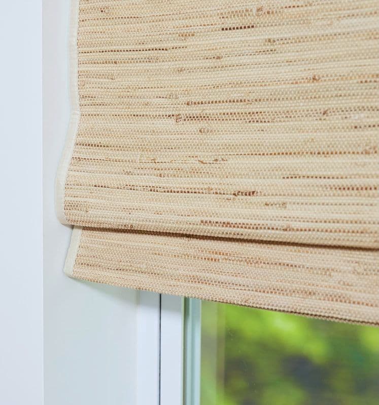 Edge binding detail on a woven wood shade