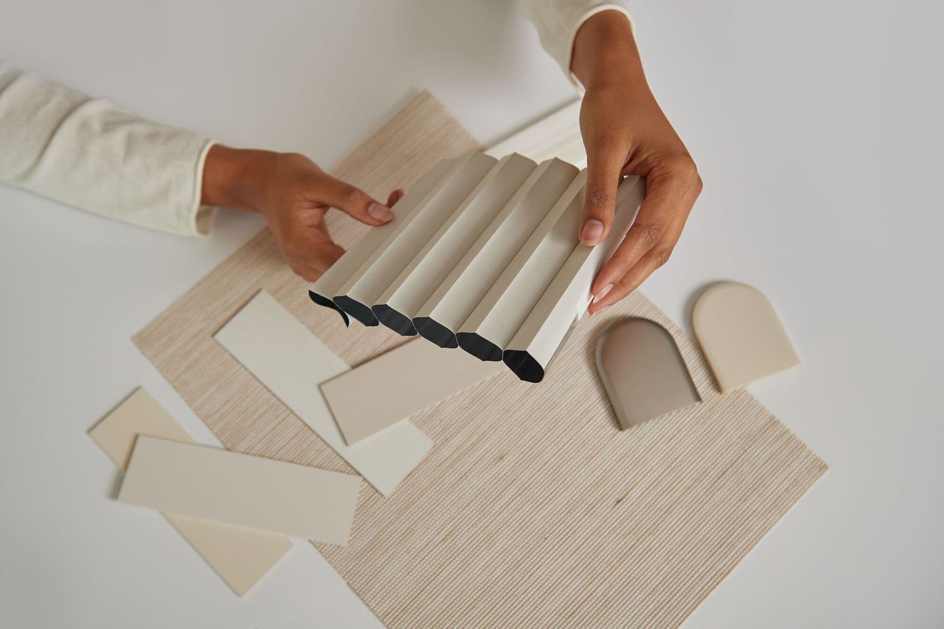 Cream cellular shade with wood caps