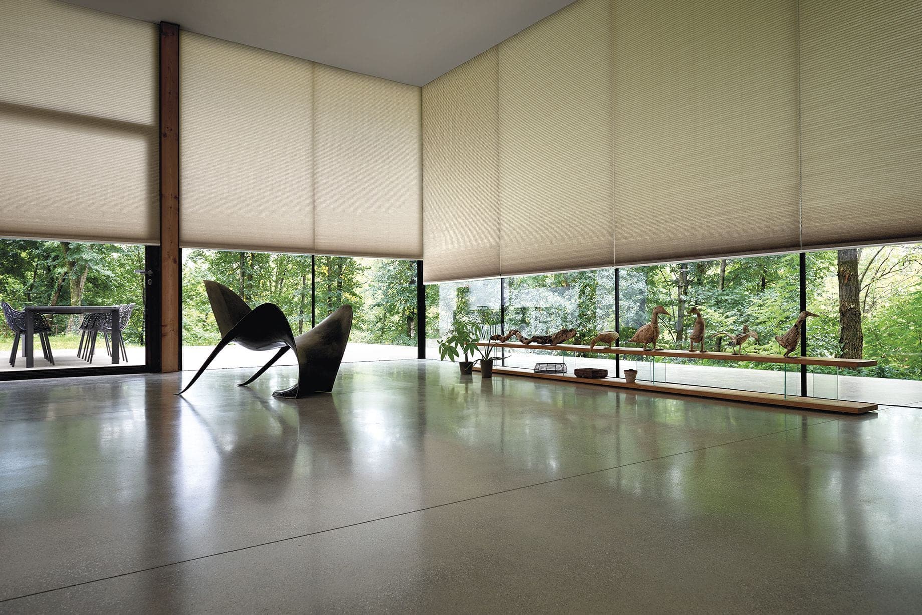 Motorized cellular shades across a wide opening
