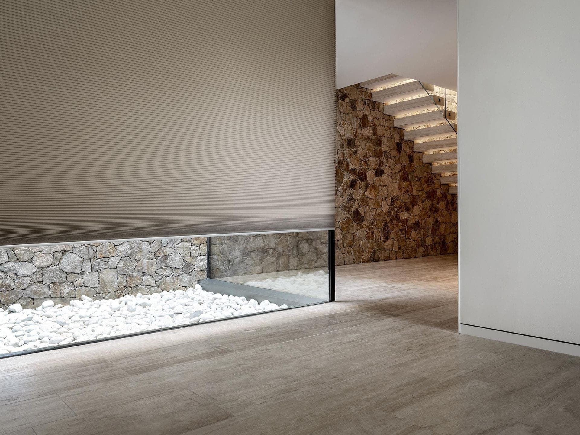 Cellular shades on a tall window