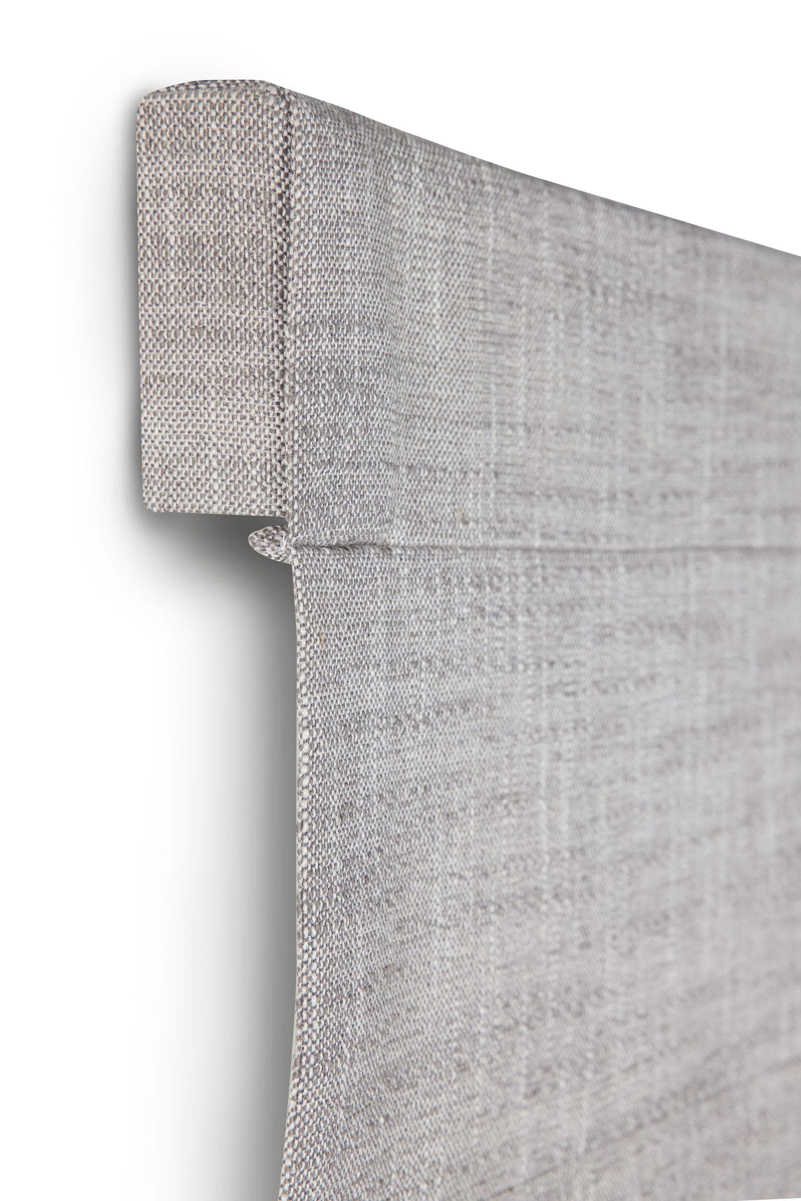 Return detail on an outside mounted roman shade