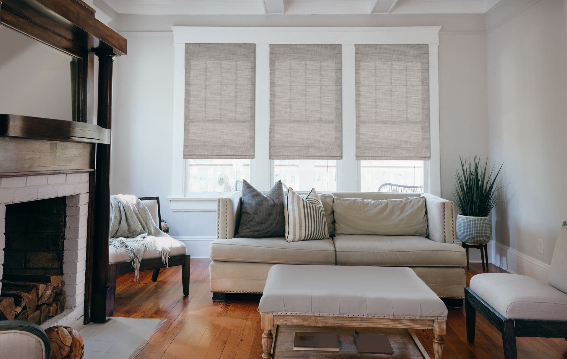 A roman shade above a window
